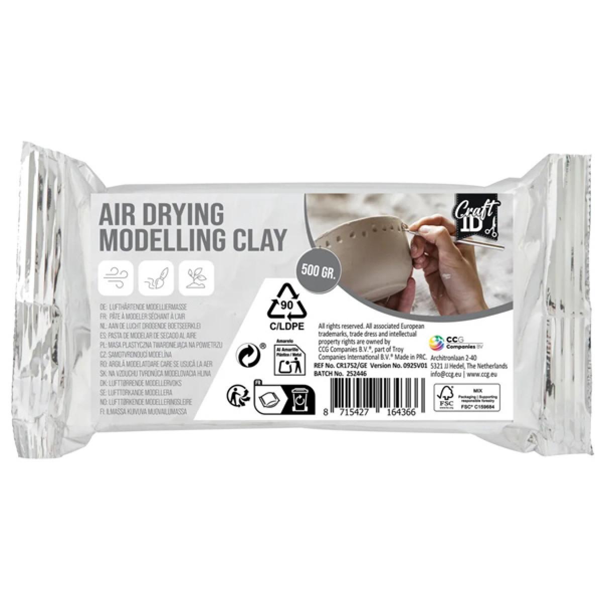 Bela glina za modeliranje od 500 g. 